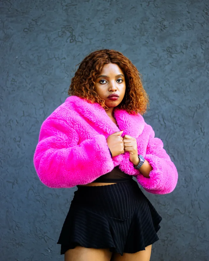 uSmokolo Shots editorial portrait, pink faux fur jacket